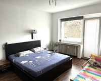 Schlafzimmer mit Balkon