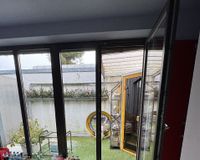 Schlafzimmer OG mit Blick auf Patio und Sauna