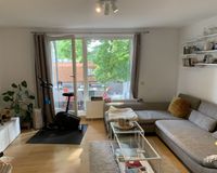 Wohnzimmer mit Balkon